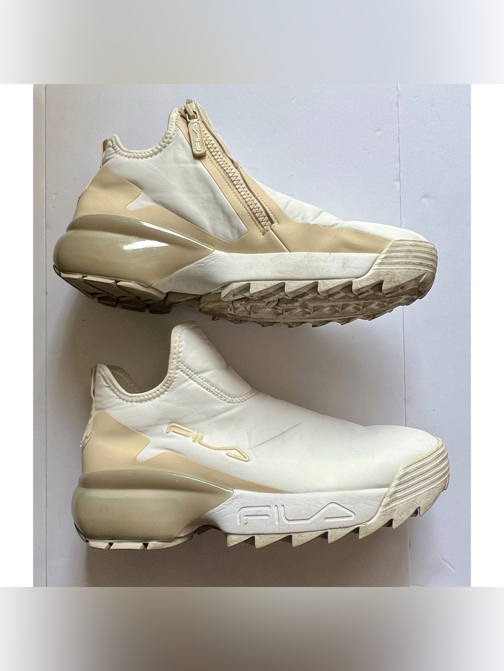 Fila white high top zip closure sneakers US Women’s 9